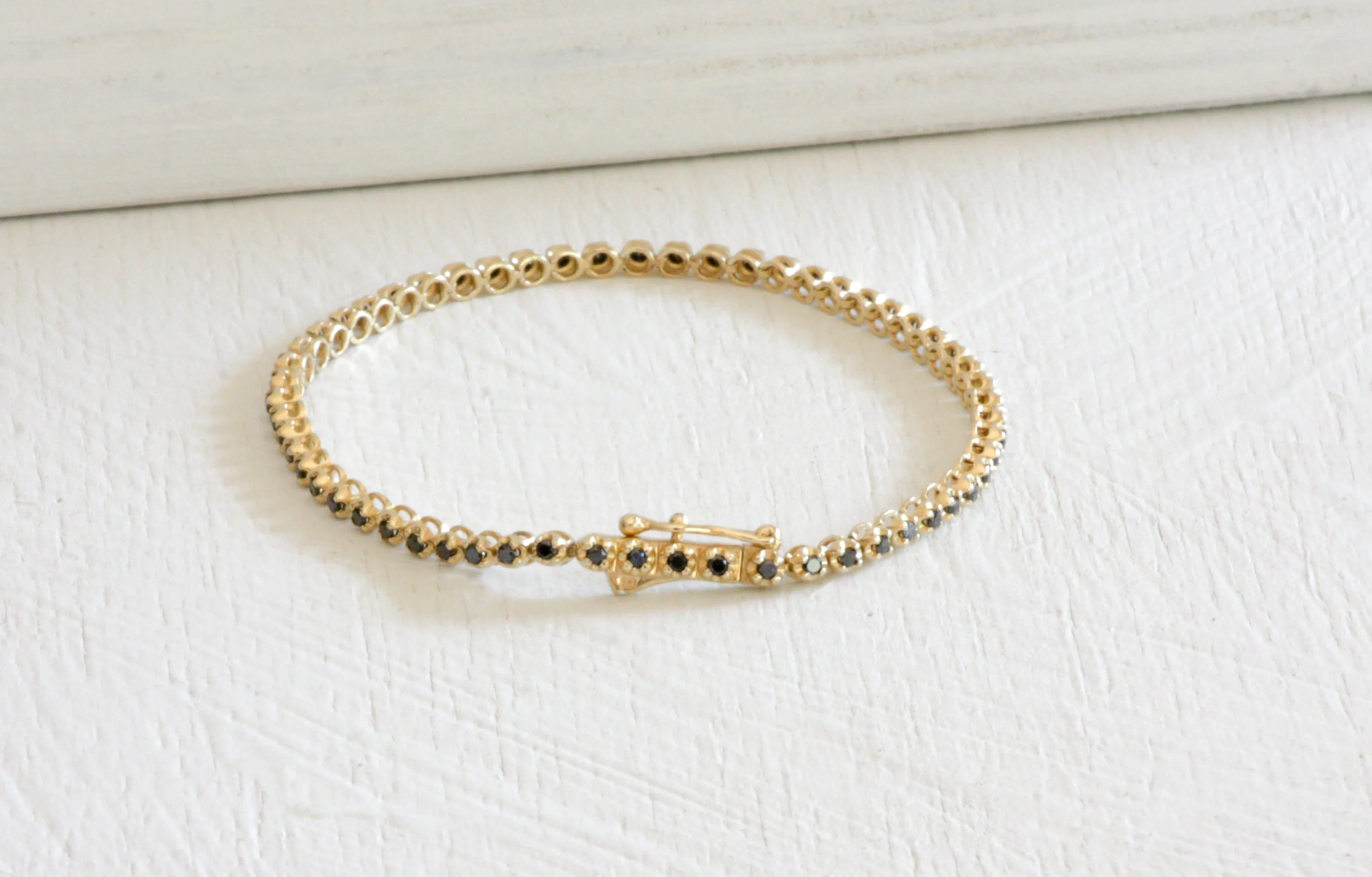Gold Tennis Bracelet with Black Diamonds