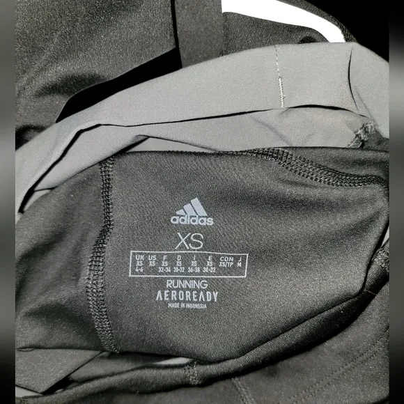 NWOT! Womens Areoready Adidas biker shorts.